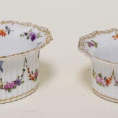 1039	PAIR OF GERMAN PORCELAIN OVAL SALTS, APPROXIMATELY 2 1/2 IN X 3 1/2 IN X 1 1/2 IN HIGH
