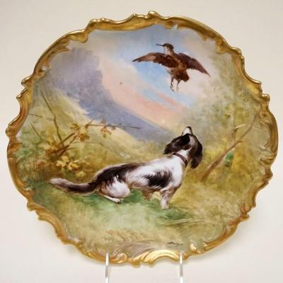 1037	LARGE HAND PAINTED LIMOGES ARTIST SIGNED PLATE OF DOG W/BIRD, APPROXIMATELY 13 IN
