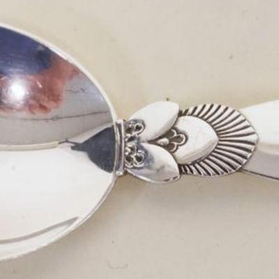 1055	GEORG JENSEN CACTUS PATTERN STERLING SPOON, 0.87 OZT, APPROXIMATELY 4 IN
