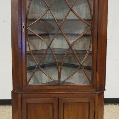 1079	NARROW ANTIQUE MAHOGANY 2 PART CORNER CABINET W/INDIVIDUAL PANE GLASS DOOR, APPROXIMATELY 30 IN X 17 IN X 83 IN HIGH
