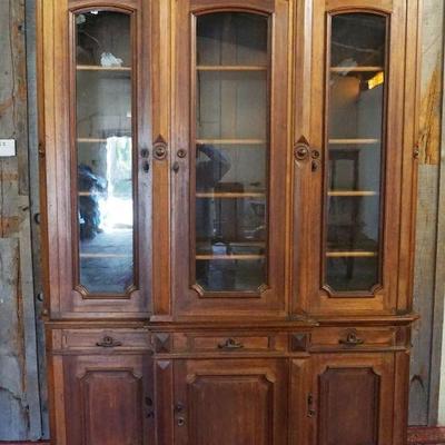 1106	WALNUT VICTORIAN 2 PART BOOKCASE HAVING 3 DRAWERS & 6 DOORS, APPROXIMATELY 67 IN X 19 IN X 93 IN HIGH, LOSS TO MOLDING
