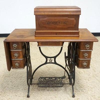 1102	ANTIQUE *DOMESTIC* TREADLE SEWING MACHINE IN OAK CASE, APPROXIMATELY 36 IN X 17 IN X 39 IN HIGH
