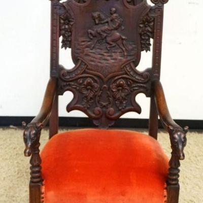 1089	HEAVILY CARVED WALNUT LARGE THRONE CHAIR W/HUNT SCENE & DOG HEAD ARM ENDS, APPROXIMATELY 62 IN HIGH
