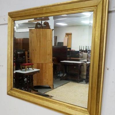 1150	BEVELED GLASS MIRROR IN GILT FINISHED FRAME, APPROXIMATELY 38 IN X 33 IN
