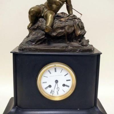 1228	ANTIQUE FRENCH CLOCK IN SLATE CASE WITH CAST METAL FIGURE OF YOUNG BOY FISHING. SOME LOSS TO CASTING, APPROXIMATELY 19 IN H
