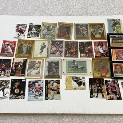 Baseball, football , hockey and basketball cards 