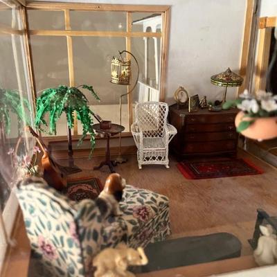 Items in photo are miniature dollhouse