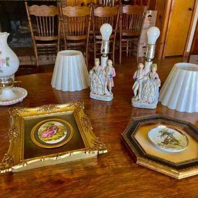 Lot 043-LR: Porcelain Glass Lamps and Art

Features:
â€¢	Three porcelain glass lamps
â€¢	Two framed art; one featuring a couple, the...
