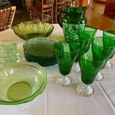 Lot 042-LR: Green Glass Lot

Features:
â€¢	Collection of antique green glass
â€¢	Goblets, plates, pitcher, bowls, and cream & sugar...