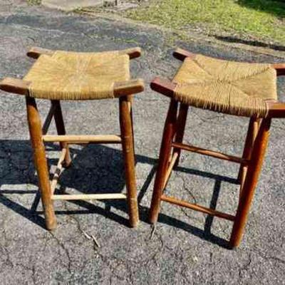 Lot 032-P: Pair of Rush-Seated Stools

Features: 
â€¢	Matching pair of wooden-framed stools with wicker/rattan seat

Dimensions: Both are...