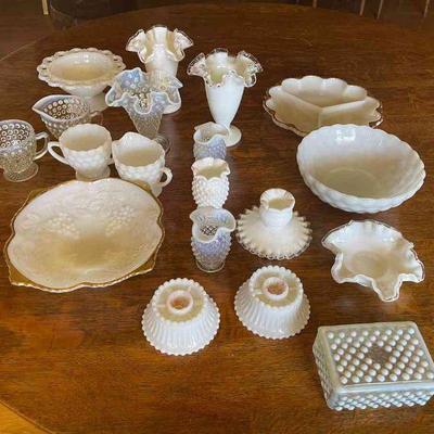 Lot 062-LR: White Glass Lot

Features: 
â€¢	19 pieces
â€¢	Large and small vases, cream & sugar bowls, candlestick holders, various bowls...