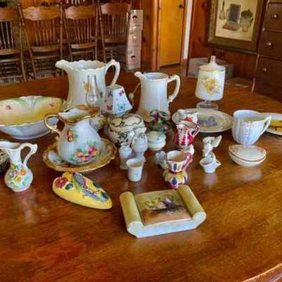 Lot 045-LR: Colorful Porcelain

Features: 
â€¢	Various porcelain vases, pitchers, bowls, plates, etc.


Dimensions (selected items, for...