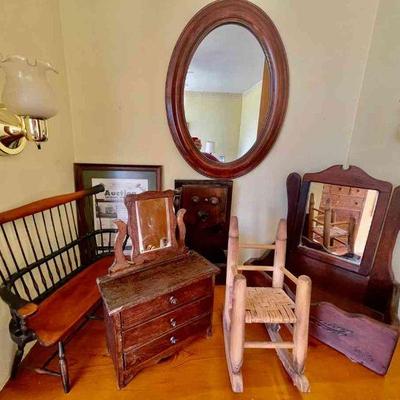 Lot 110-BR2: Wood Vignette

Includes: 
â€¢	Antique dresser-top mirrored tray
â€¢	Doll-sized rocker, mirrored dresser and Windsor bench...