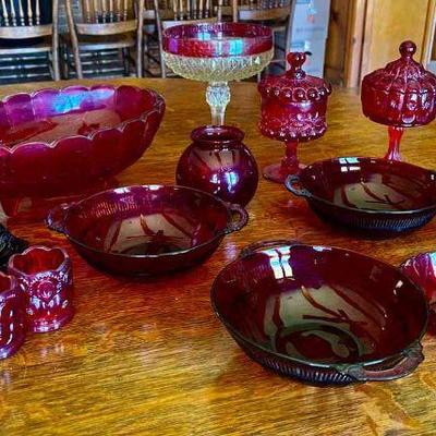 Lot 041-LR: Red Glass Lot

Features:
â€¢	Collection of antique red glass
â€¢	A bakerâ€™s dozen of various bowls and dishes

Dimensions:...