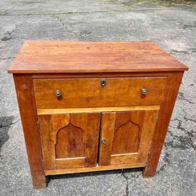 Lot 003-G: Antique Wooden Chest

Features: 
â€¢	Two drawers and cabinet with doors
â€¢	Original skeleton key included

Dimensions:...