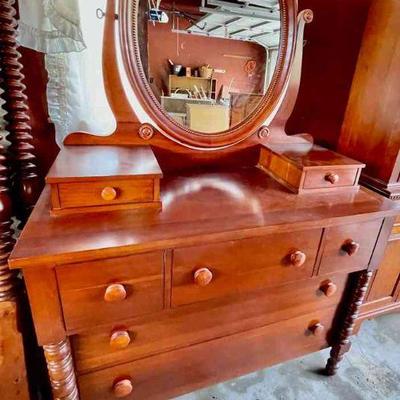 Lot 017-G: Davis Cabinet Mirrored Dresser

Features: 
â€¢	â€œCollectorâ€™s Cherryâ€ Finish
â€¢	Made of solid Cherry wood
â€¢	Stock No.:...