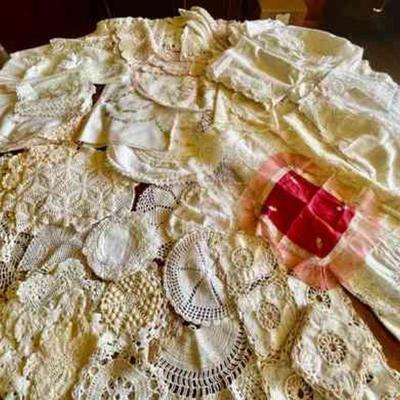 Lot 107-BR1: Vintage Linen Collection

Features: 
â€¢	Lot includes several doilies, table runners, handkerchiefs, etc.


Dimensions: Lot...
