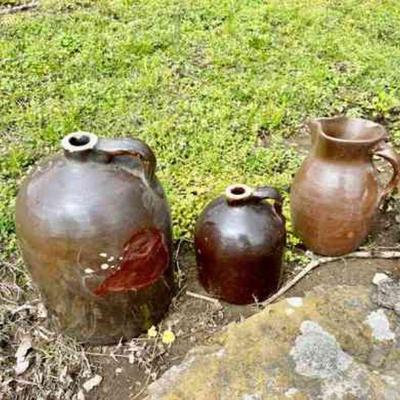 Lot 134-G: Antique Pottery Trio

Includes: 
â€¢	Largest jug has etched â€œ2â€ on top.
â€¢	One small jug (no visible markings)
â€¢	One...