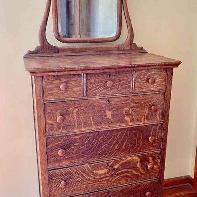 Lot 109-BR2: Antique Dresser and Mirror

Features: 
â€¢	Oak antique dresser with attached, swiveling mirror 

Dimensions:
â€¢	Dresser â€“...