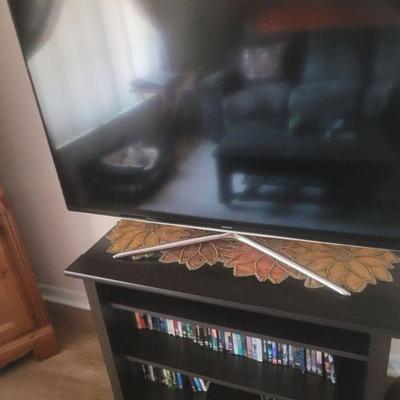 TV  and an entertainment table/cabinet