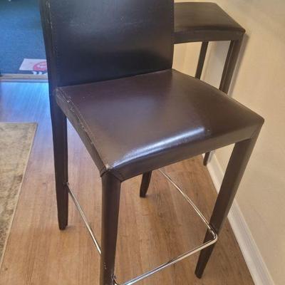 There are a pair of these bar height stools