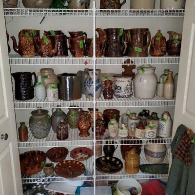 PANTRY FULL OF BROWN GLAZED ENGLISH PITCHERS, SOME MAJOLICA