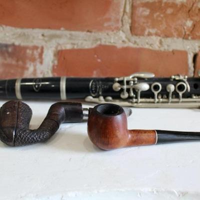 Lots of tobacco pipes, clarinet 