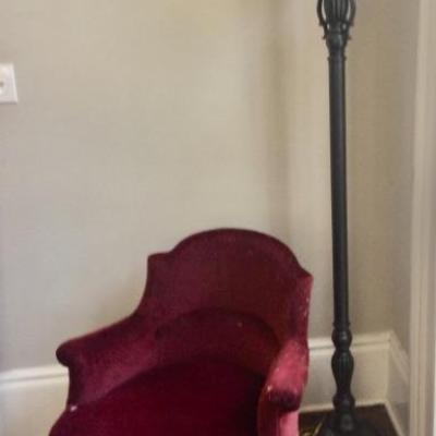 Burgundy easy chair, tall floor lamp