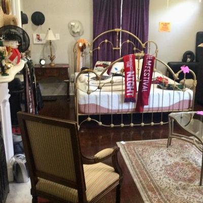 Antique chair , brass bed