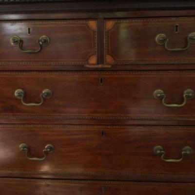 Details of chest on chest cabinet