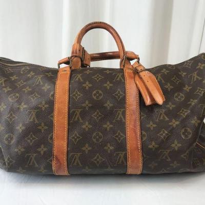 VINTAGE LOUIS VUITTON
GO TO HARMONYROADESTATES.COM TO BID NOW