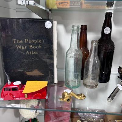 The People's War Book, small Fire Truck, Incredible Brass Fish Nozzle, Four Beer Bottles