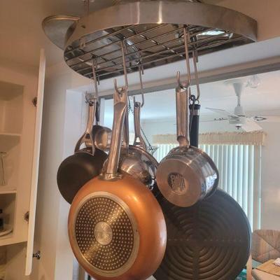 Some of the pots and pans and a separate ceiling pan holder
