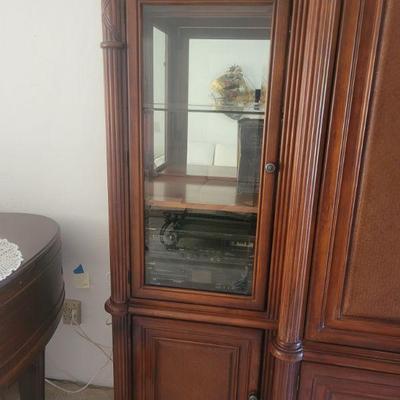One of three pieces of an entertainment center. Pieces can be bought as a unit or separately