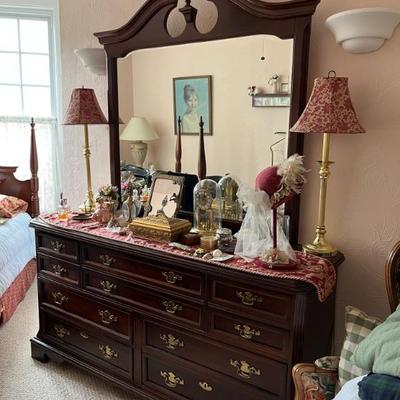 Chippendale style long dresser with a large mirror, mahogany finish and brass batwing pulls (not pictured is matching highboy dresser)