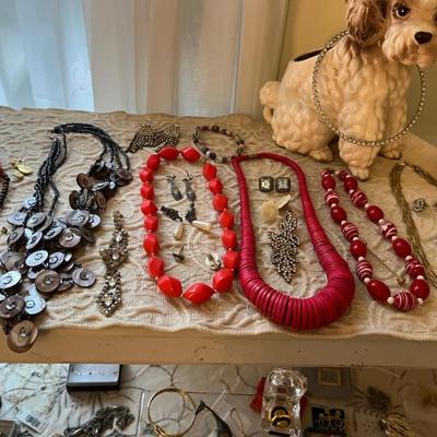 Loads of costume jewelry, an entire room filled--Trifari, Napier, Monet and more.