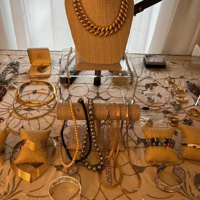 Loads of costume jewelry, an entire room filled--Trifari, Napier, Monet and more.