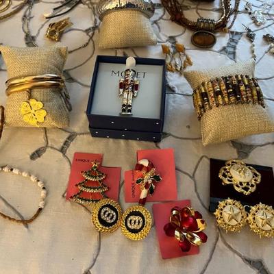 Loads of costume jewelry, an entire room filled--Trifari, Napier, Monet and more.