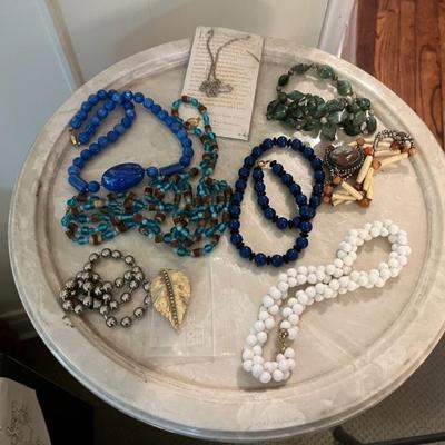 Loads of costume jewelry, an entire room filled--Trifari, Napier, Monet and more.