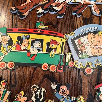 mid century Disney wall hangings, including Dumbo