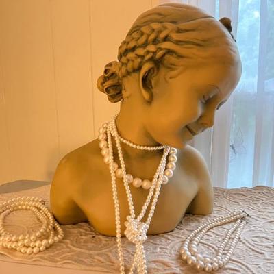 Loads of costume jewelry, an entire room filled--Trifari, Napier, Monet and more.