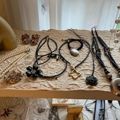 Loads of costume jewelry, an entire room filled--Trifari, Napier, Monet and more.