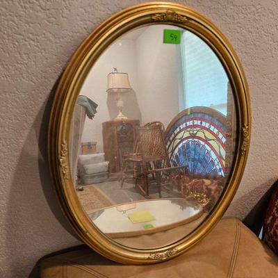 THE UTTERMOST CO GOLD OVAL WALL MIRROR