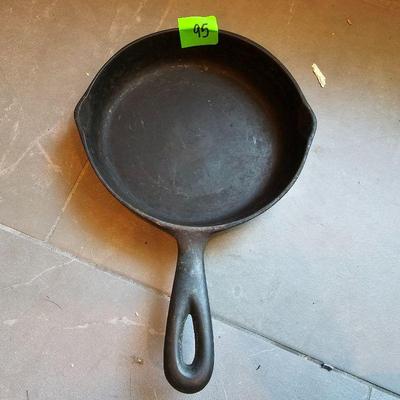 7 IN. CAST IRON SKILLET MARKED 3 IN DIAMOND- A
