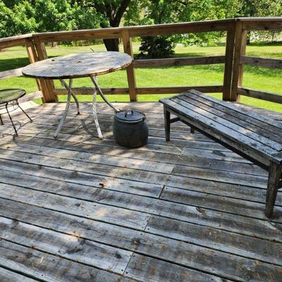 Wrought iron table, wood bench