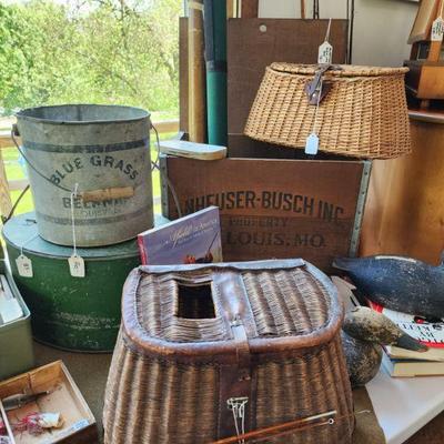 Wicker creels, minnow buckets, anheuser Busch wood crate,orvis fly rod