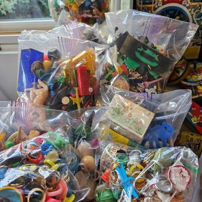 Bags of vtg.gumball & cracker box toys. .Plastics/misc sm.toys