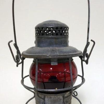 1147	ADLAKE RED GLOBE RAILROAD LANTERN N.Y.C.S. RR, APPROXIMATELY 10 IN HIGH
