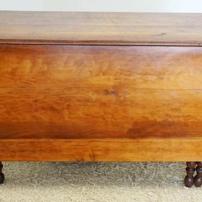 1034	ANTIQUE CHERRY DROP LEAF TABLE, APPROXIMATELY 22 IN X 26 IN X 29 IN HIGH, 65 IN OPEN
