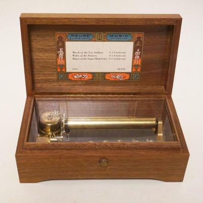 1059	SWISS REUGE MUSIC BOX, APPROXIMATELY 8 IN X 4 1/2 IN X 3 IN HIGH
